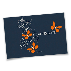 Vergrößere Abbildung Dunkelblaue Glückwunschkarten mit Silberprägung, ausgestanzten Schmetterlingen und farbigem Einlegeblatt in Orange
